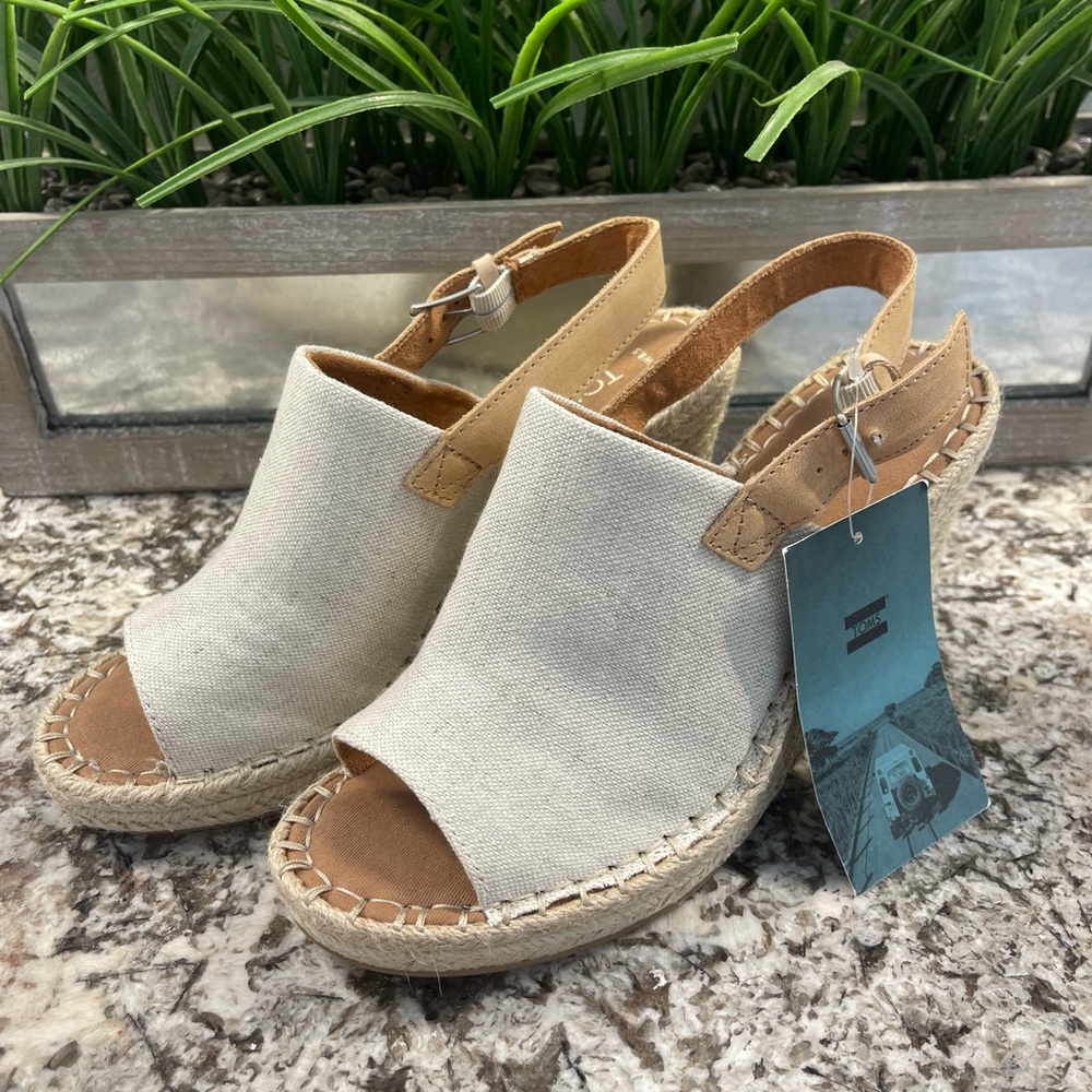 Tom’s wedge sandal size 8.5 cream canvas.